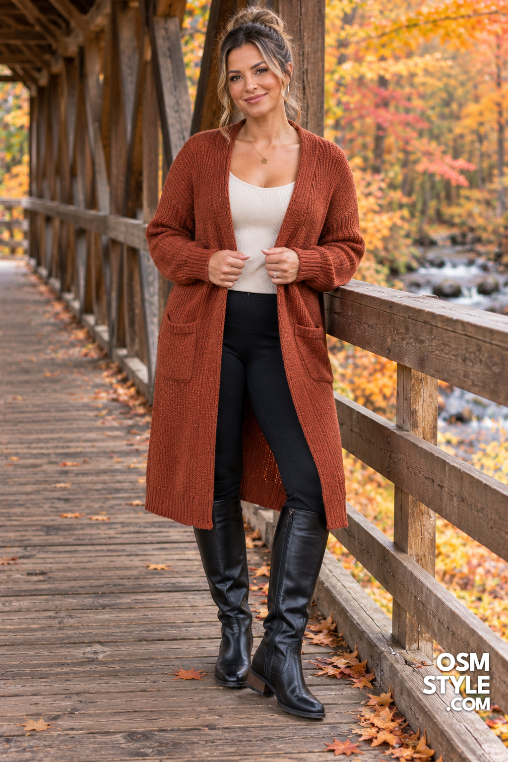 17. Black Knee Boots And A Rust Cardigan